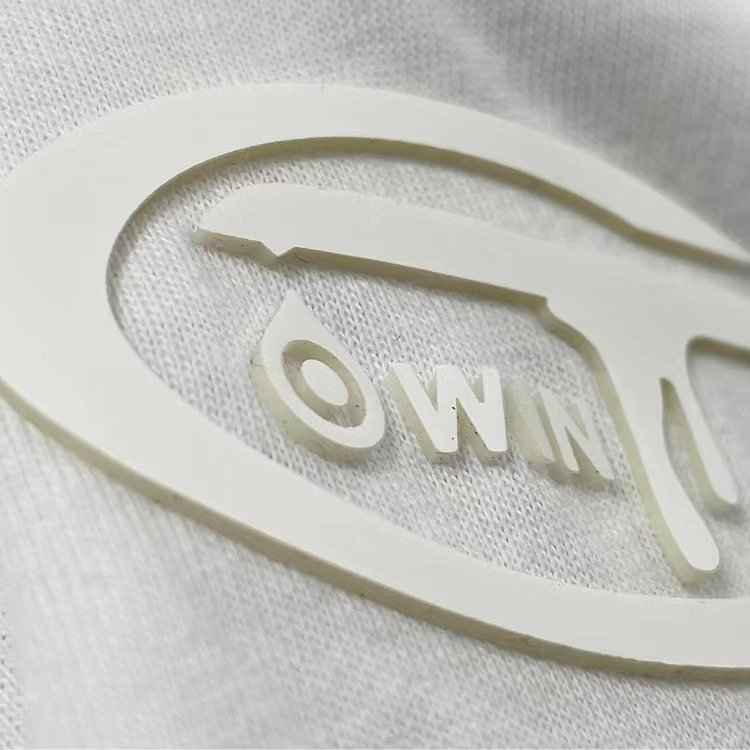 Custom embossed 3D raised logo TPU and silicone heat transfer label hot press molding