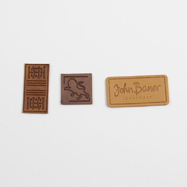 Heat Transfer Backside Custom Debossed Logo Pure Leather iron on Patches with Adhesive Backing