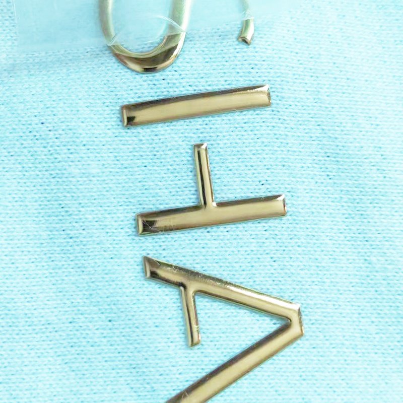 Golden letters Wholesale custom 3D embossed Clothing badge TPU heat transfer printing with PVC high-frequency label