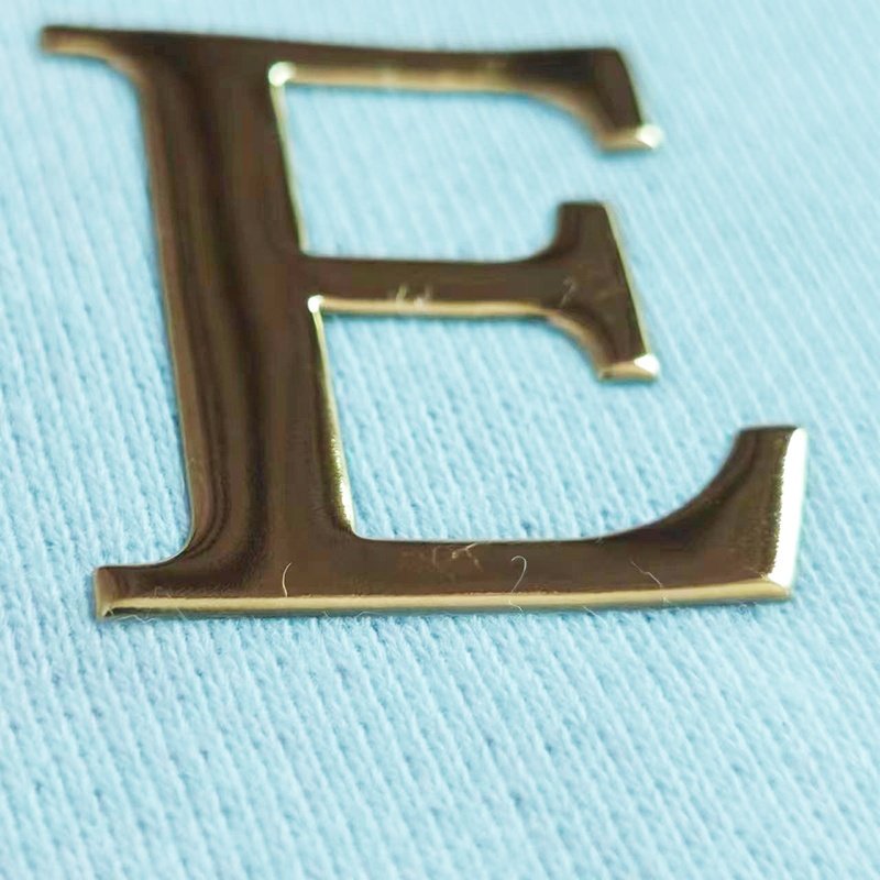 Golden letters Wholesale custom 3D embossed Clothing badge TPU heat transfer printing with PVC high-frequency label