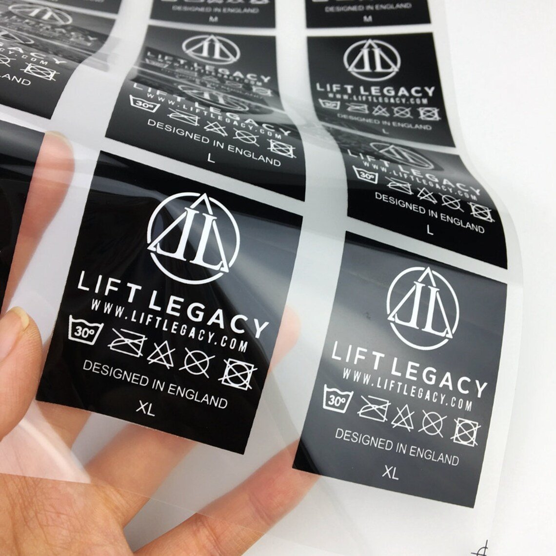 custom brand garment labels high quality anti-sublimation plastisol DTF printing transfer stickers for shirts clothing transfers