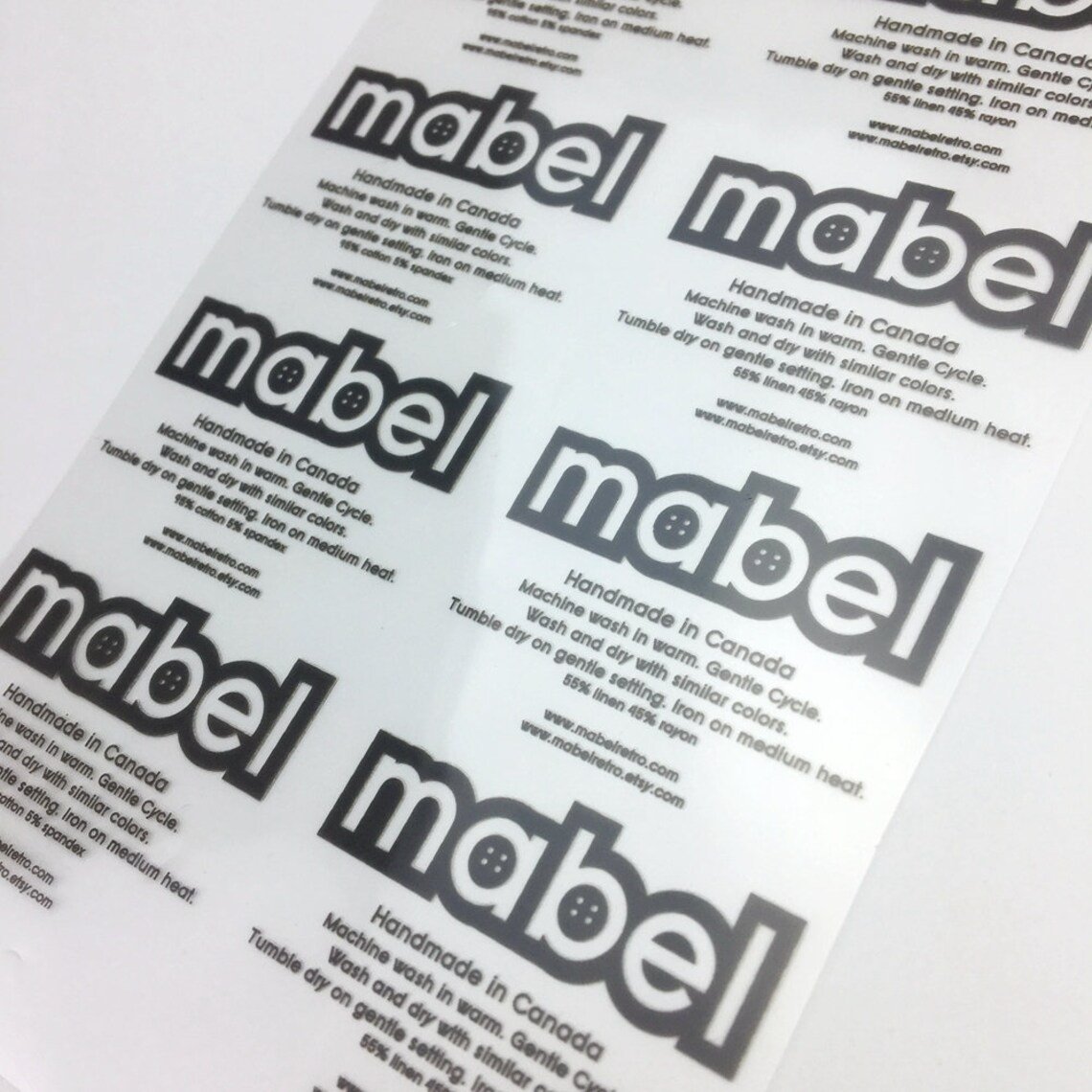 custom brand garment labels high quality anti-sublimation plastisol DTF printing transfer stickers for shirts clothing transfers
