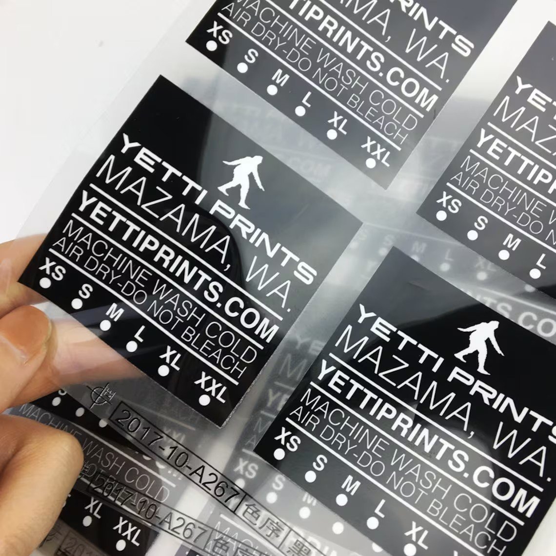 custom brand garment labels high quality anti-sublimation plastisol DTF printing transfer stickers for shirts clothing transfers