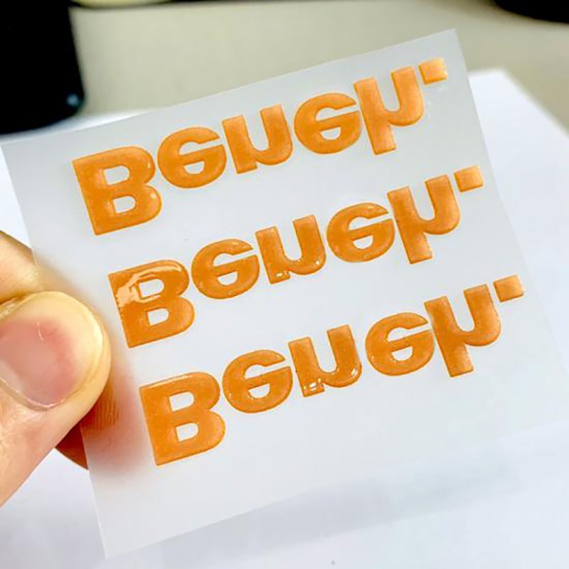 China manufactures custom design logo heat transfer 3d silicone rubber labels iron on vinyl clothing labels