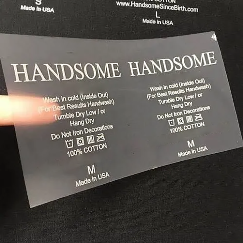 China manufactures custom design logo heat transfer 3d silicone rubber labels iron on vinyl clothing labels