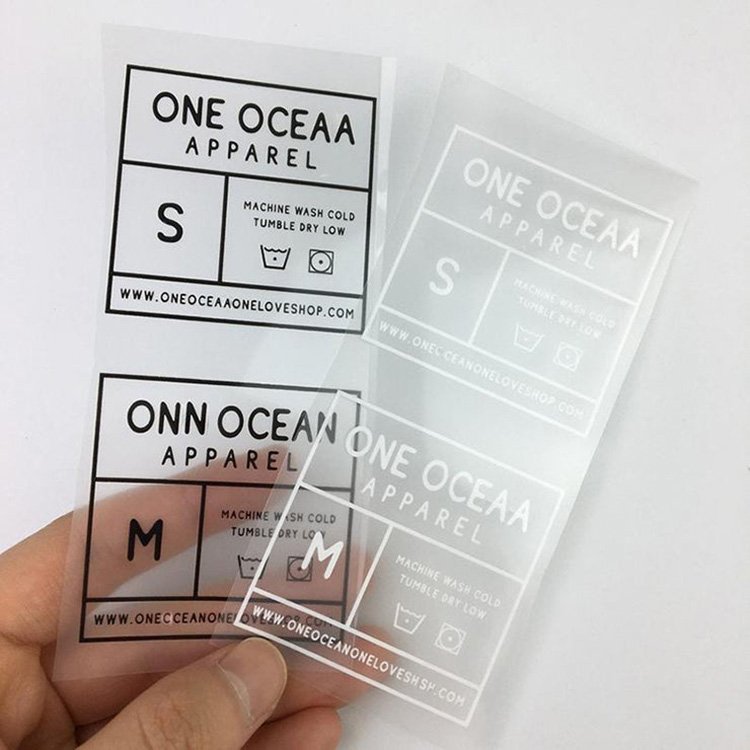 China manufactures custom design logo heat transfer 3d silicone rubber labels iron on vinyl clothing labels