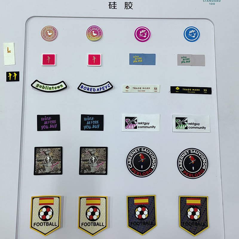 Best quality custom brand logo soft silicone 3d heat transfer labels sewing woven badge patch clothing labels
