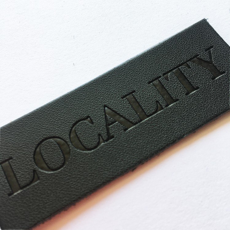 Wholesale custom heat transfer pu leather label patch for jeans