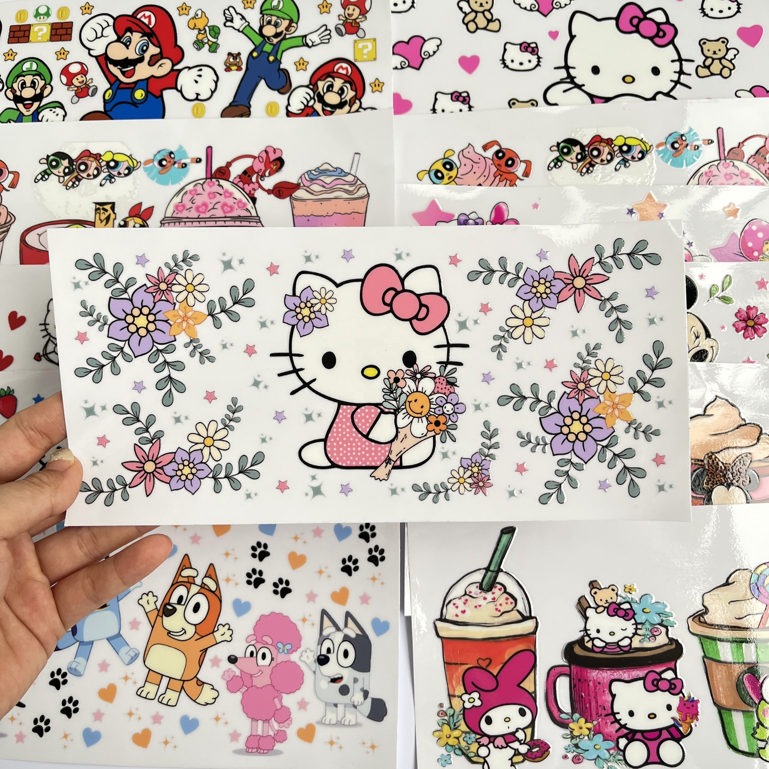 Custom1500+ designs high quality uv dtf wrap transfers 24oz 20oz 16oz cartoon logos transfer printing uv dtf wraps for cups
