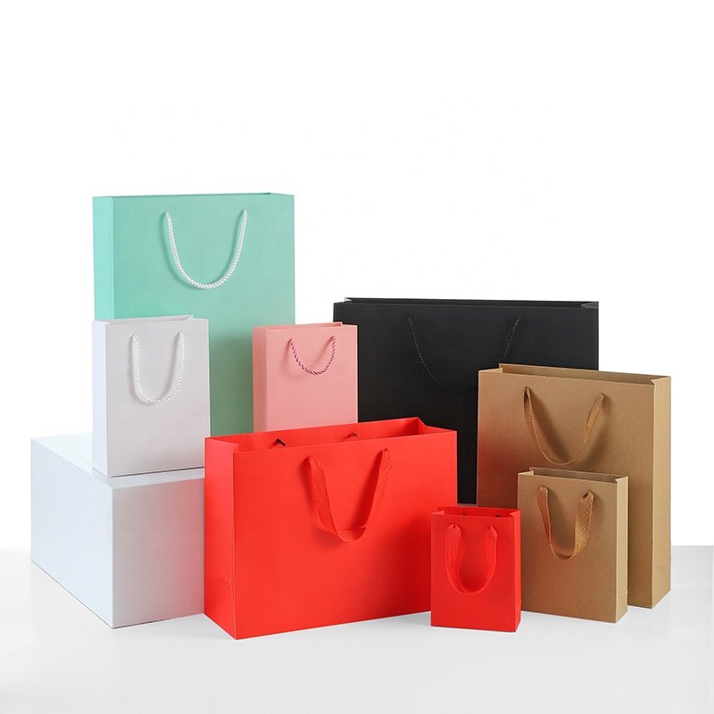 Manufacturer Wholesale Pink Paper Shopping Gift Packaging Shipping Bag For Garment Clothing Shoes Toy Storage