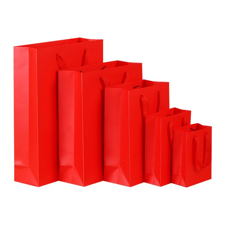 China Factory Wholesale PP Handle Clothing Package Bags Ivory Paper Shopping Bags With Your Own Logo Apparel Promotional Bags