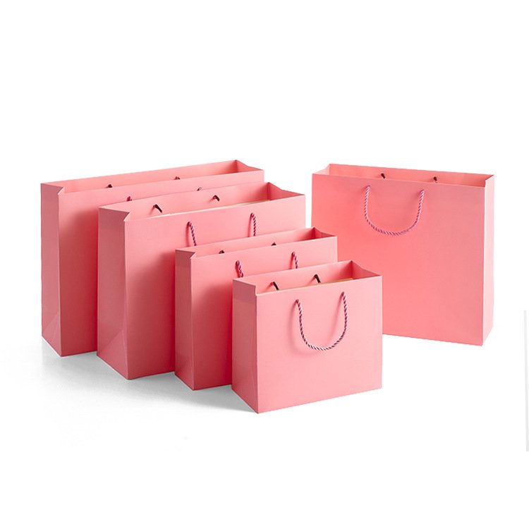 China Factory Wholesale PP Handle Clothing Package Bags Ivory Paper Shopping Bags With Your Own Logo Apparel Promotional Bags
