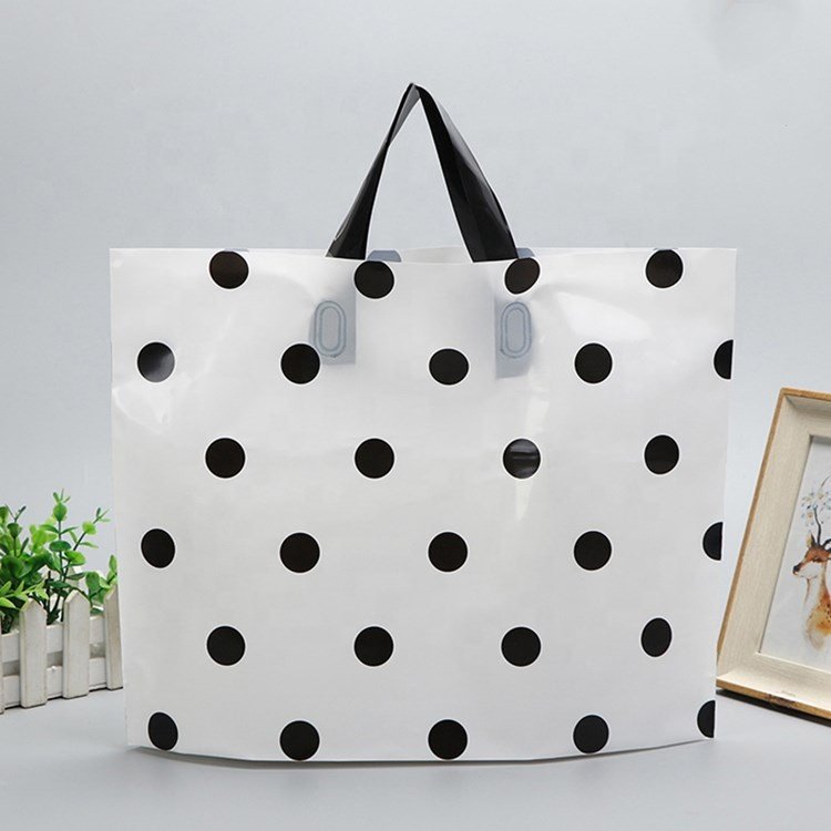 durable premium white polka dot plastic loop handle poly carry gift shopping bags with bottom gusset