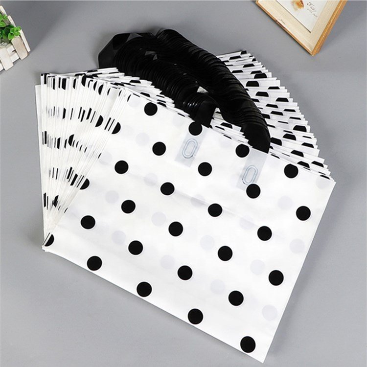 durable premium white polka dot plastic loop handle poly carry gift shopping bags with bottom gusset