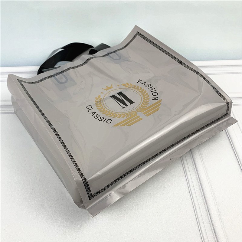 Chen Han Factory Stock Large Capacity PE Plastic Handbag Thickened Printed Clothing Shopping Bag for Packaging and Gifts