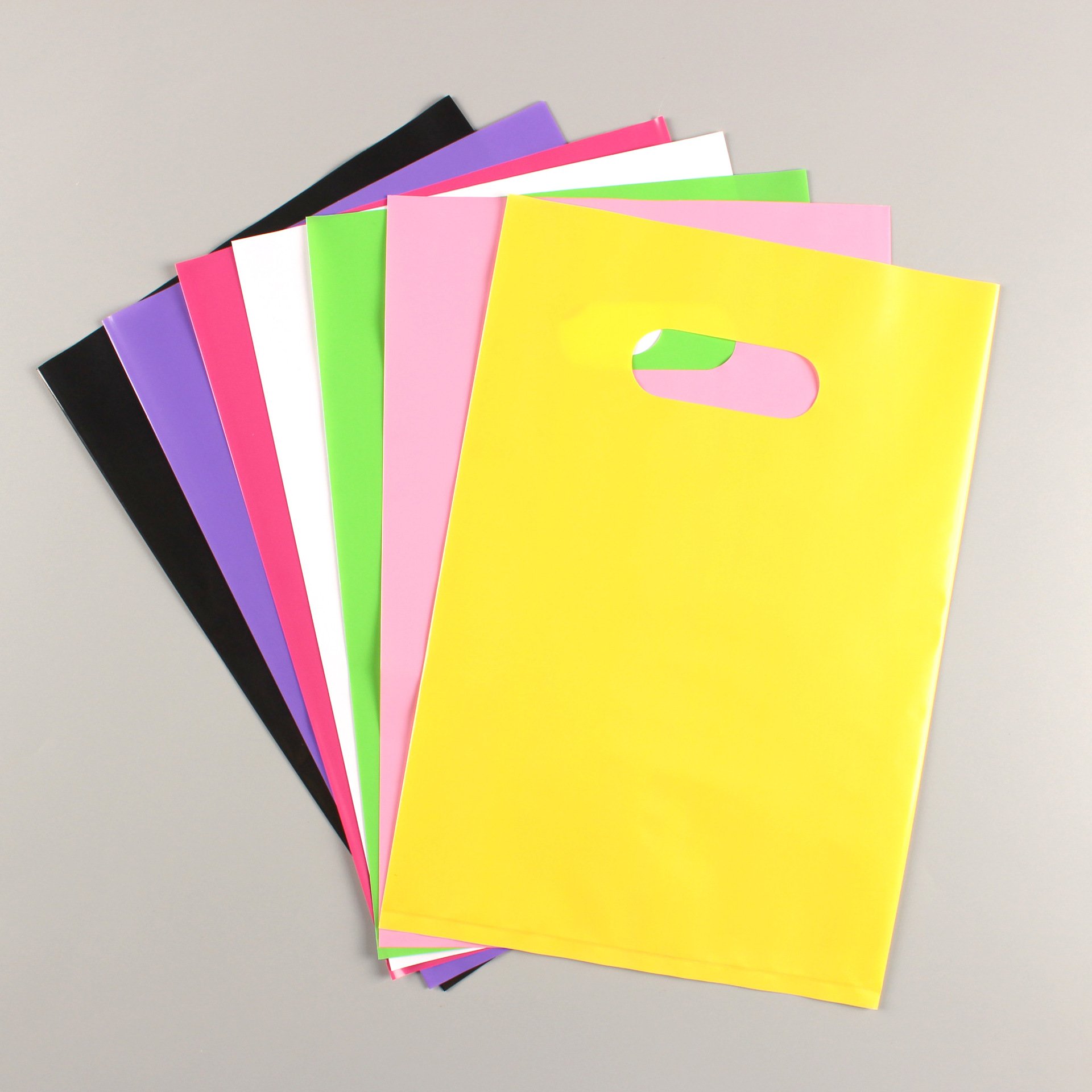 cheap custom heavy duty retail bolsas de plastico biodegradable die cut large packaging plastic shopping bags with own logo