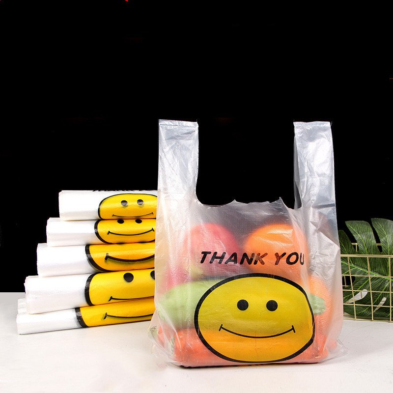 2021 Hot Selling Transparent PE LDPE Shopping Bag T-Shirt Vest Carrier Bag Customized Smiling Face Plastic Bags For Packing
