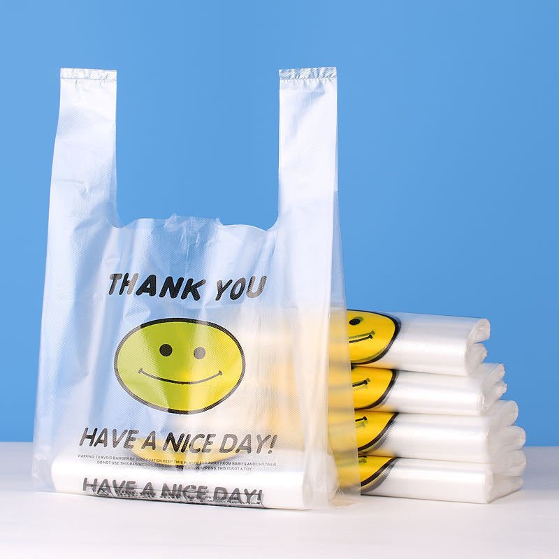 2021 Hot Selling Transparent PE LDPE Shopping Bag T-Shirt Vest Carrier Bag Customized Smiling Face Plastic Bags For Packing