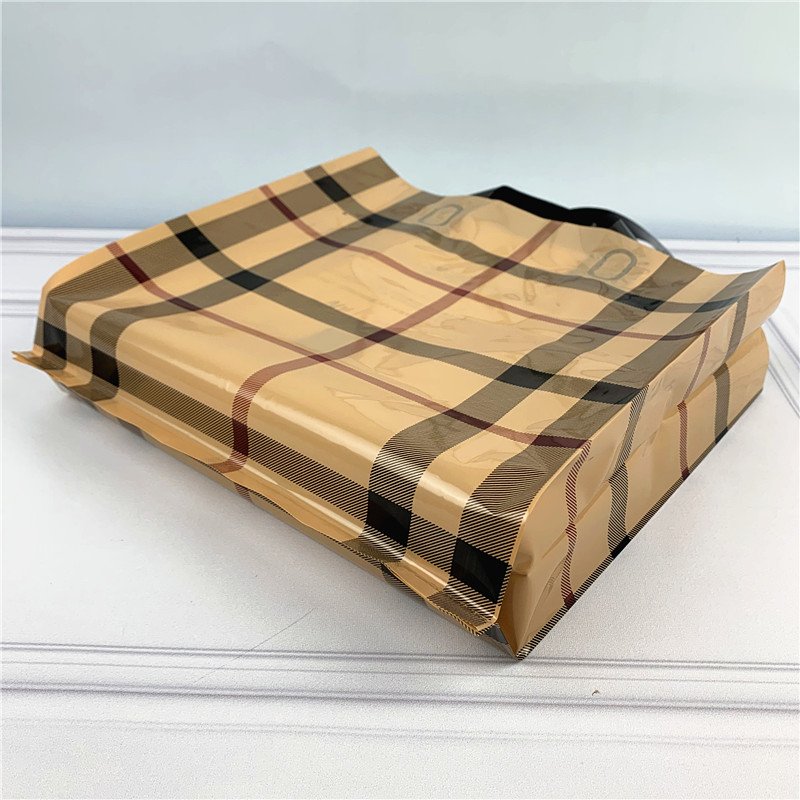 Chen Han Factory Wholesale Thickened Side Folding Hand Shopping Bag Easy-Carry Printed Plastic Clothing Packaging and Gift Bags