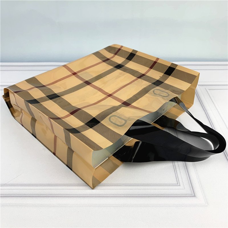 Chen Han Factory Wholesale Thickened Side Folding Hand Shopping Bag Easy-Carry Printed Plastic Clothing Packaging and Gift Bags