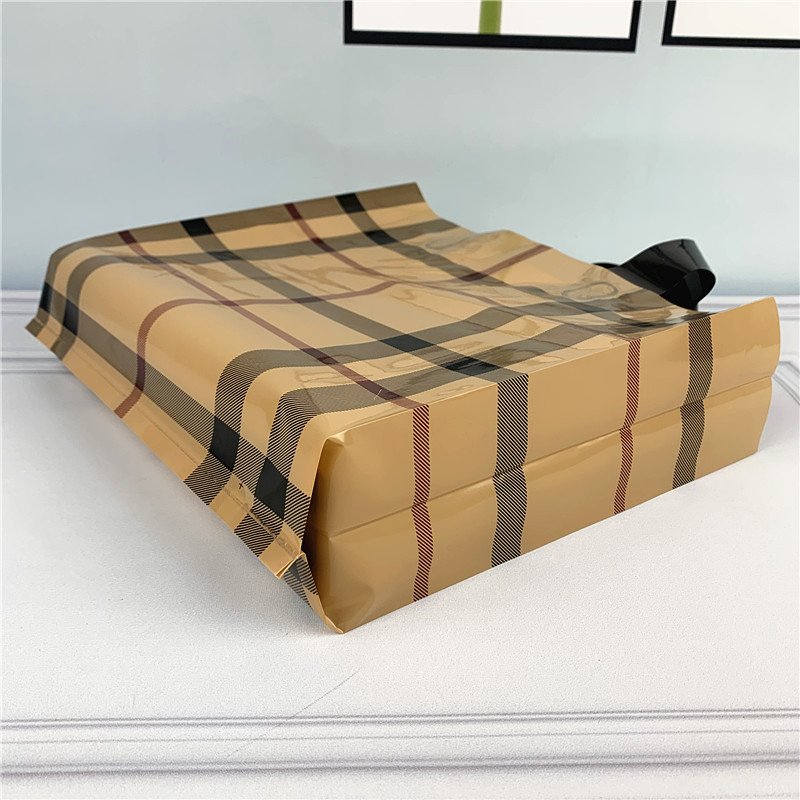 Chen Han Factory Wholesale Thickened Side Folding Hand Shopping Bag Easy-Carry Printed Plastic Clothing Packaging and Gift Bags