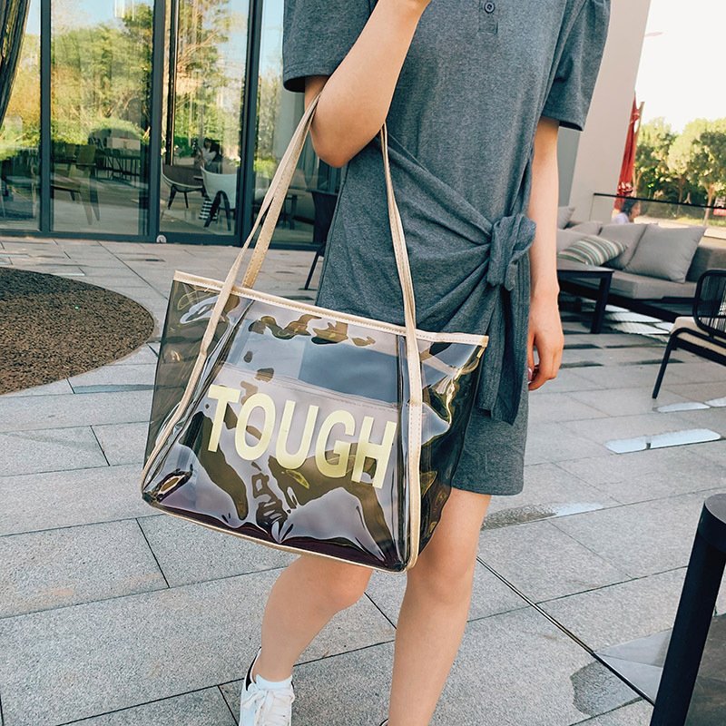 Custom Logo embossed holographic PVC tote bag for cosmetic packaging lifestyle shopping bag reusable waterproof shoulder bag