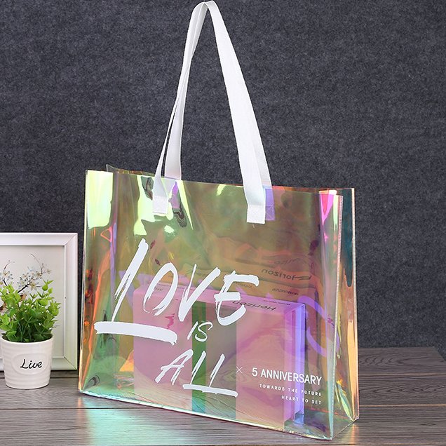fashion design shopping handle bag with custom printing logo shiny laser biodegradable pvc reusable shopping bag