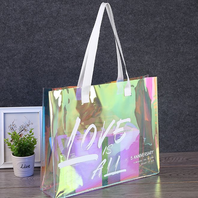fashion design shopping handle bag with custom printing logo shiny laser biodegradable pvc reusable shopping bag