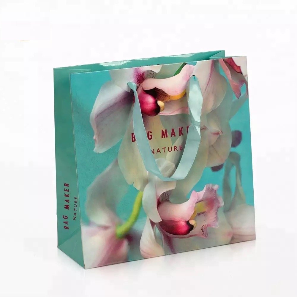 Custom Logo Fancy Shopping Bag For Cosmetic Perfume Jewelry Product Paper Bag With Ribbon