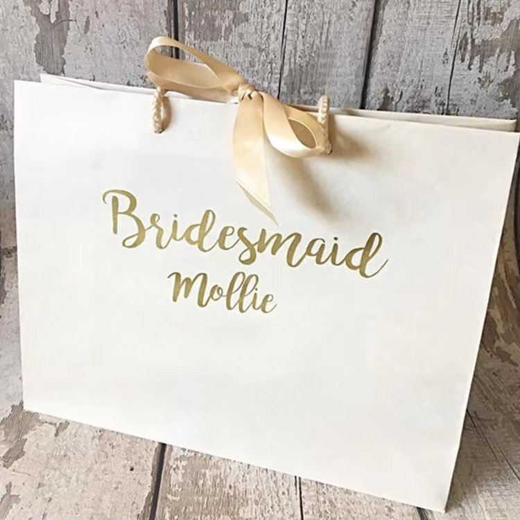 Customized Logo Metallic Foil White Cardboard Wedding Proposal Slogan Jewellery Gift Shopping Paper Bags With PP Handle Ribbon