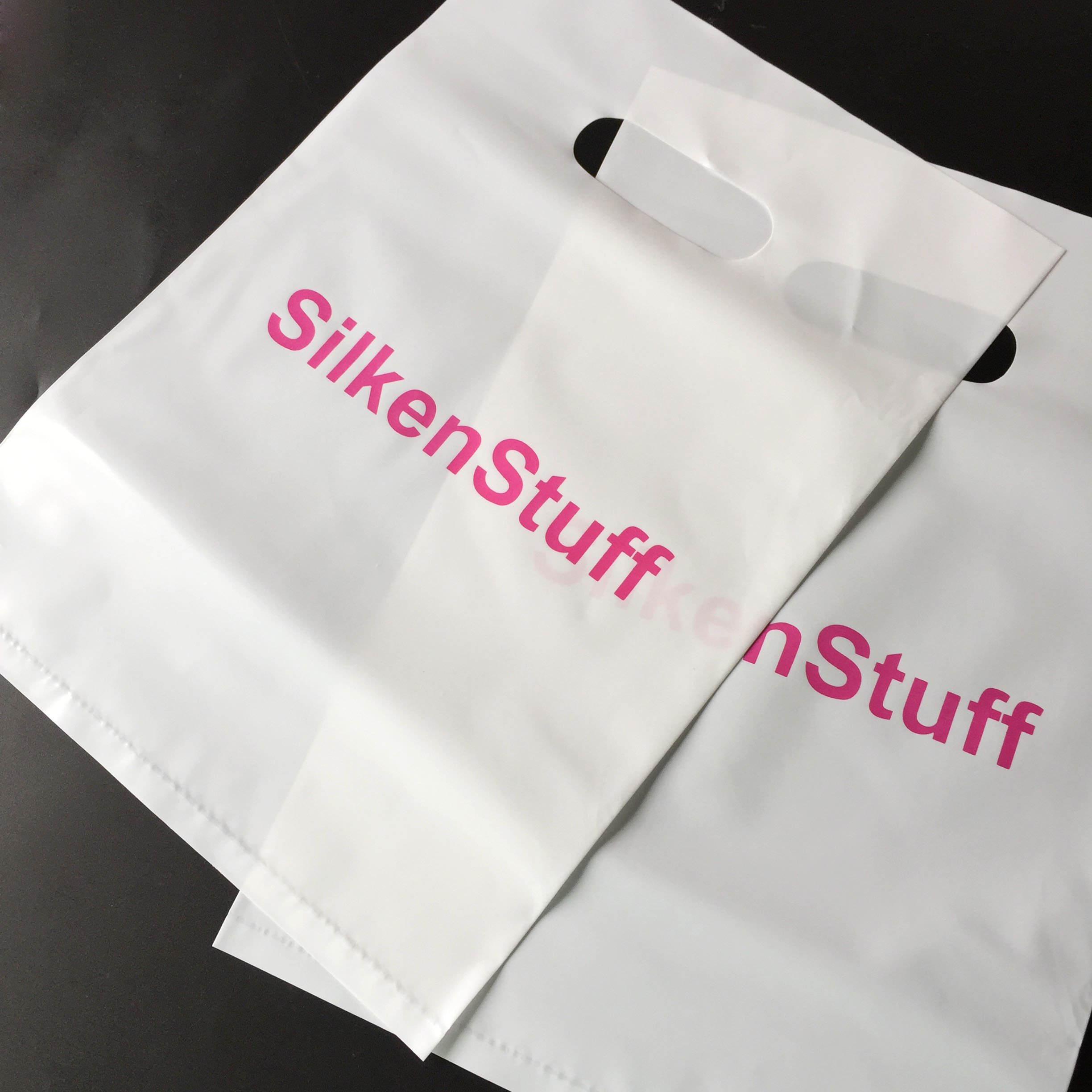 Customized die cut plastic pe thickness with logo print white carrier gift retail plastic shopping bags