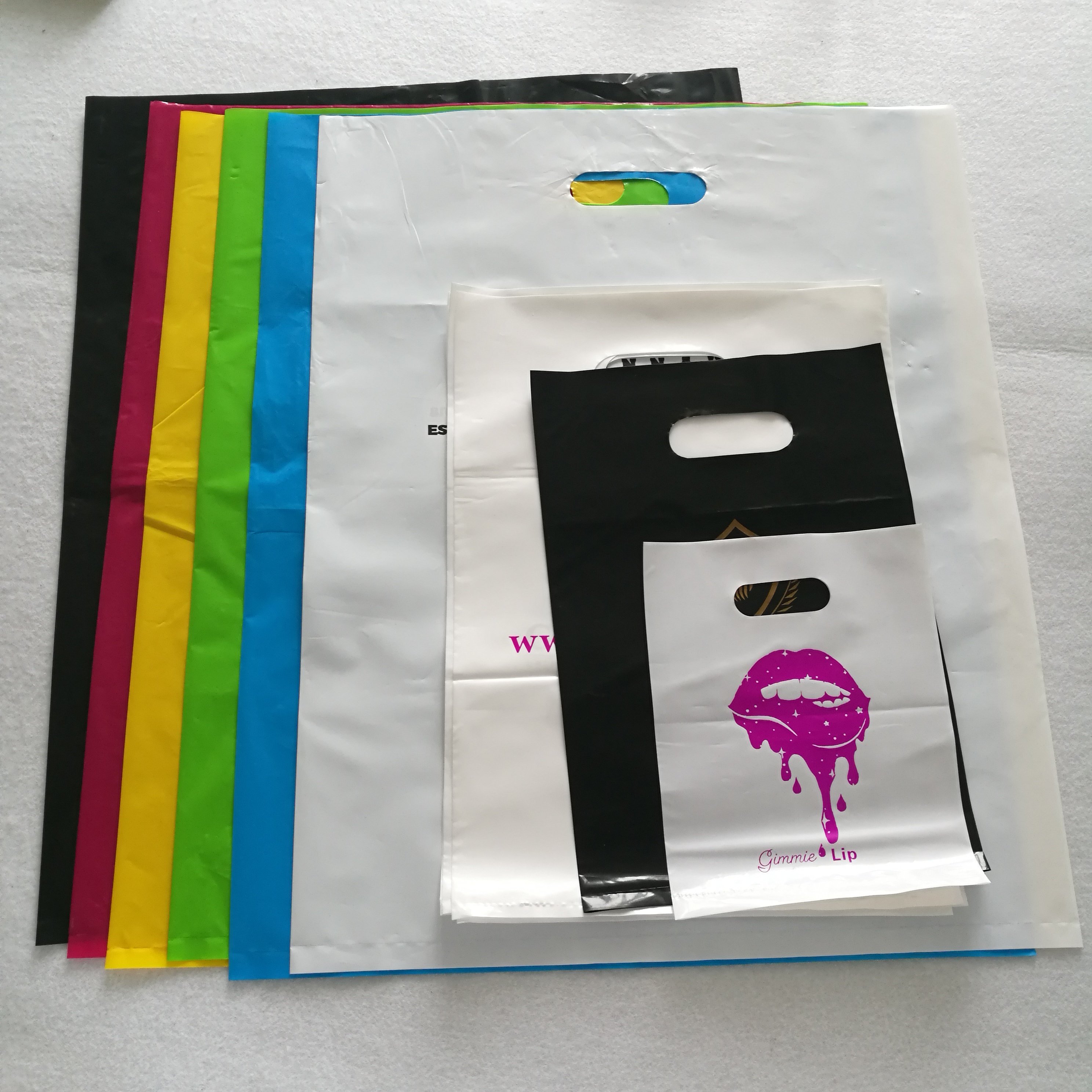 High quality 100% Biodegradable pvc die cut colorful printed logo shopping bags for clothing