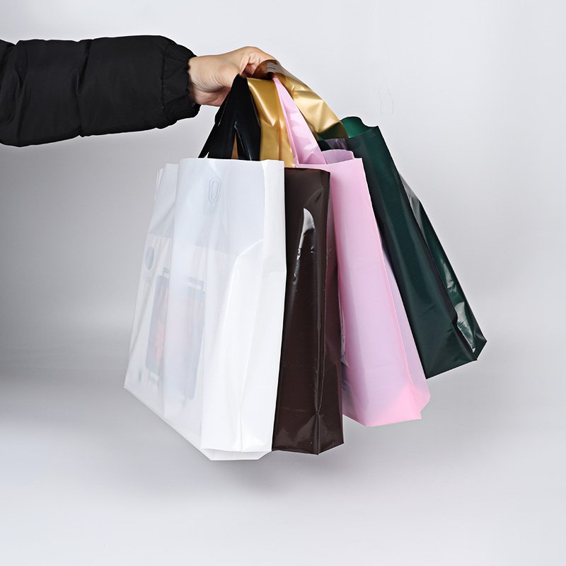 China Manufacture bags supplier soft loop handle plastic bag custom shopping bag with logo design for clothing packaging
