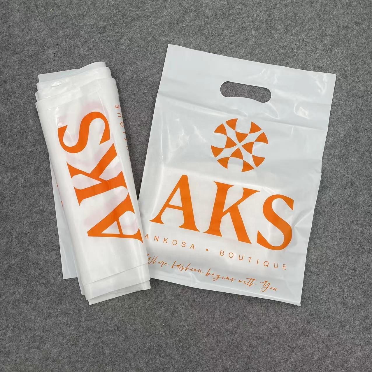 Wholesale Eco-friendly Recyclable Custom Logo Printed Die Cut Handle Plastic Packaging Shopping Bag For Clothing and Shoes