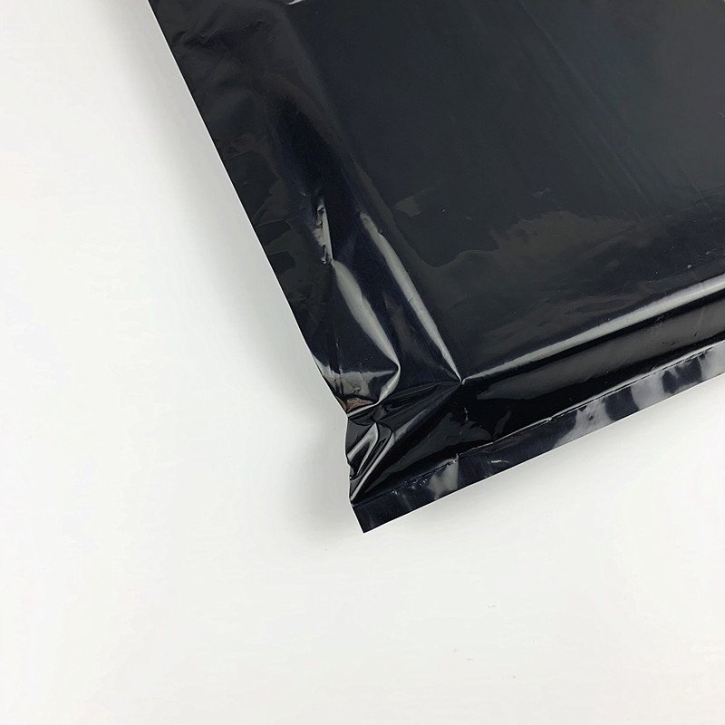 Yiwu Factory Wholesale Black Plastic Shopping Bag Pure Black Clothing Store Gift Packaging Bag with Custom Logo for Underwear