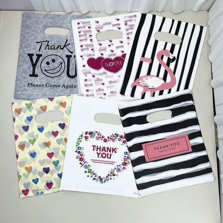 Yiwu Factory Wholesale Fashion Clothing Store Shopping Bags In-Stock PE Plastic Handbags Gravure Printing Thank You Gift Bags