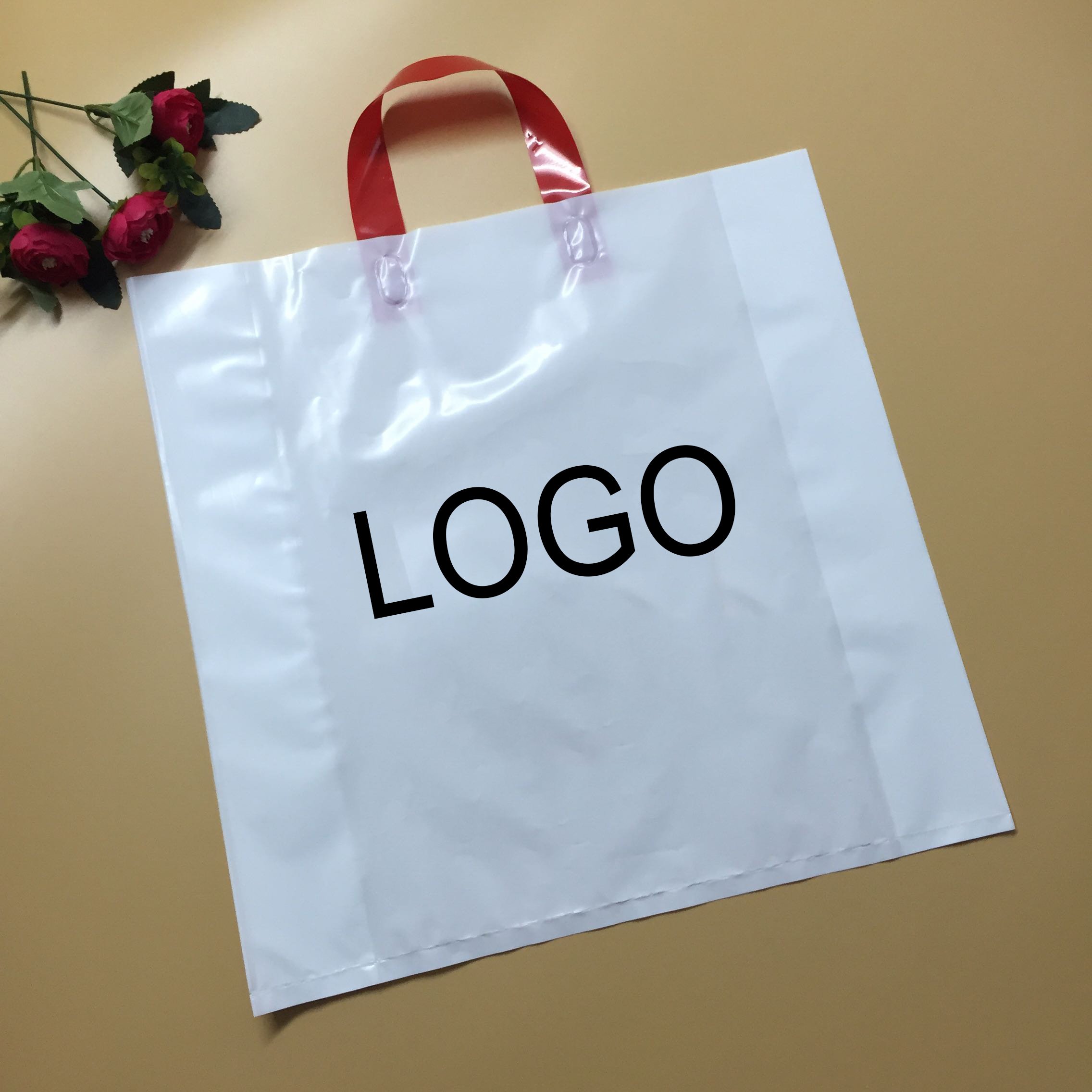 OEM custom logo patch handle plastic packaging bag shopping bag with logo plastic shopping bag