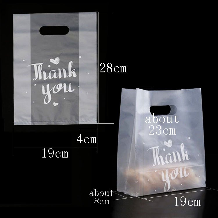 custom wholesale transparent Eco-Friendly Die Cut Handle Plastic Shopping Bags With Printing Logo