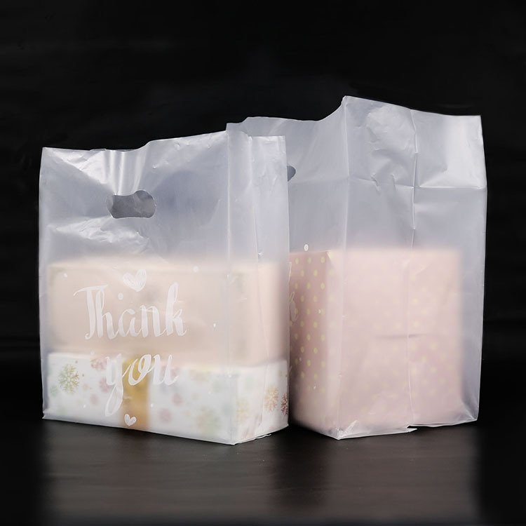 custom wholesale transparent Eco-Friendly Die Cut Handle Plastic Shopping Bags With Printing Logo