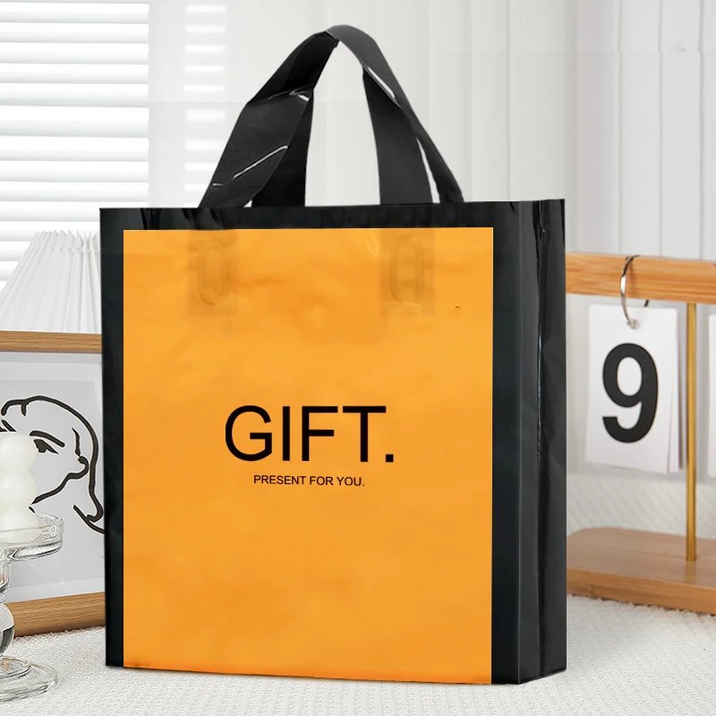 Chen Han Factory Spot Wholesale Plastic Gift Bags Fashion Printed Clothing Handbags Custom Thickened Shopping Bags