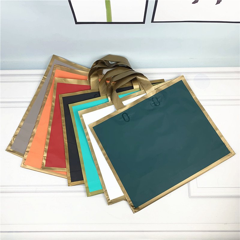 Chen Han Factory Custom Logo Gift Bag Portable Shopping Bag Gold Edge Off-the-shelf Frosted Printing Plastic Garment Packaging