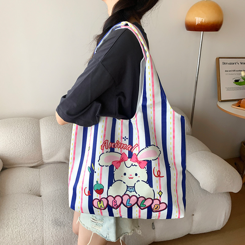 Wholesale Cute Cartoon Printed Canvas Tote Handbag Portable Reusable Shopping Bags for Daily Work Custom Logo and Pattern