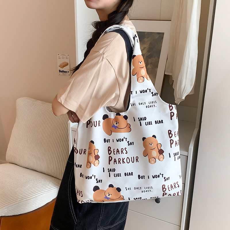 Wholesale Cute Cartoon Printed Canvas Tote Handbag Portable Reusable Shopping Bags for Daily Work Custom Logo and Pattern