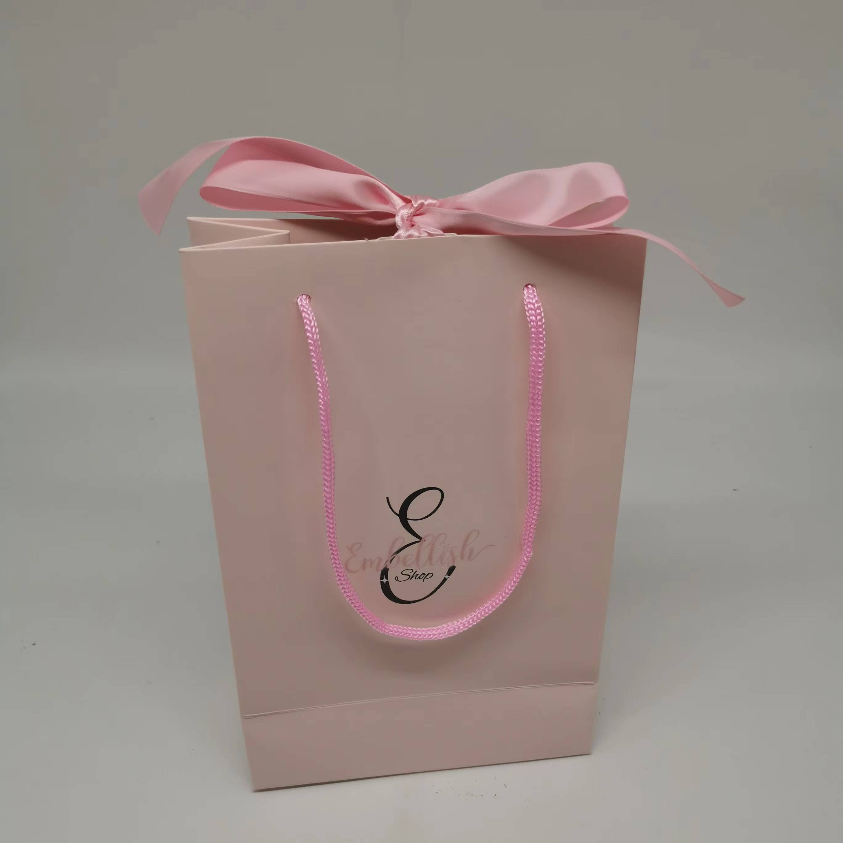 Wholesale custom printed unique design paper shopping bag with handles and ribbon