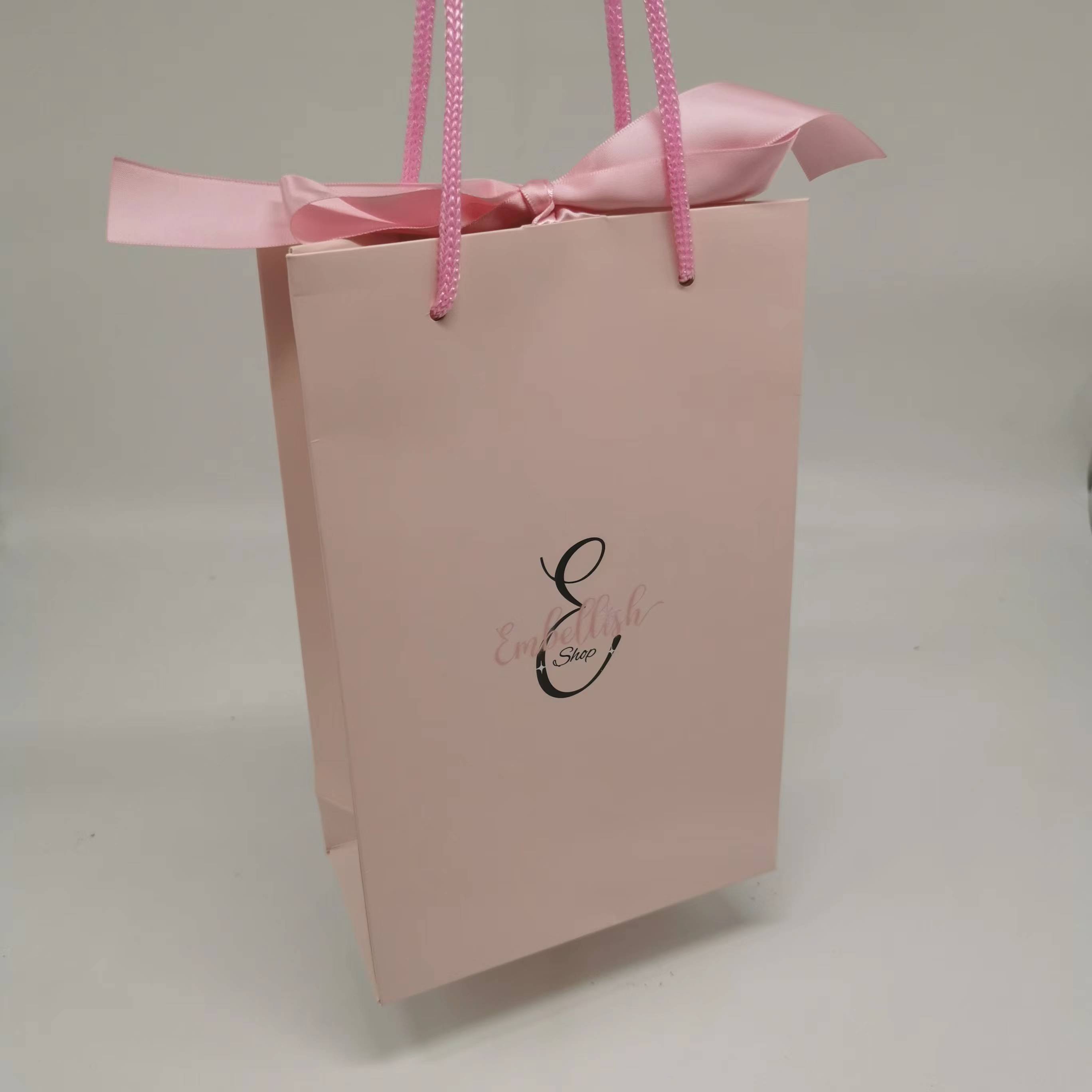 Wholesale custom printed unique design paper shopping bag with handles and ribbon
