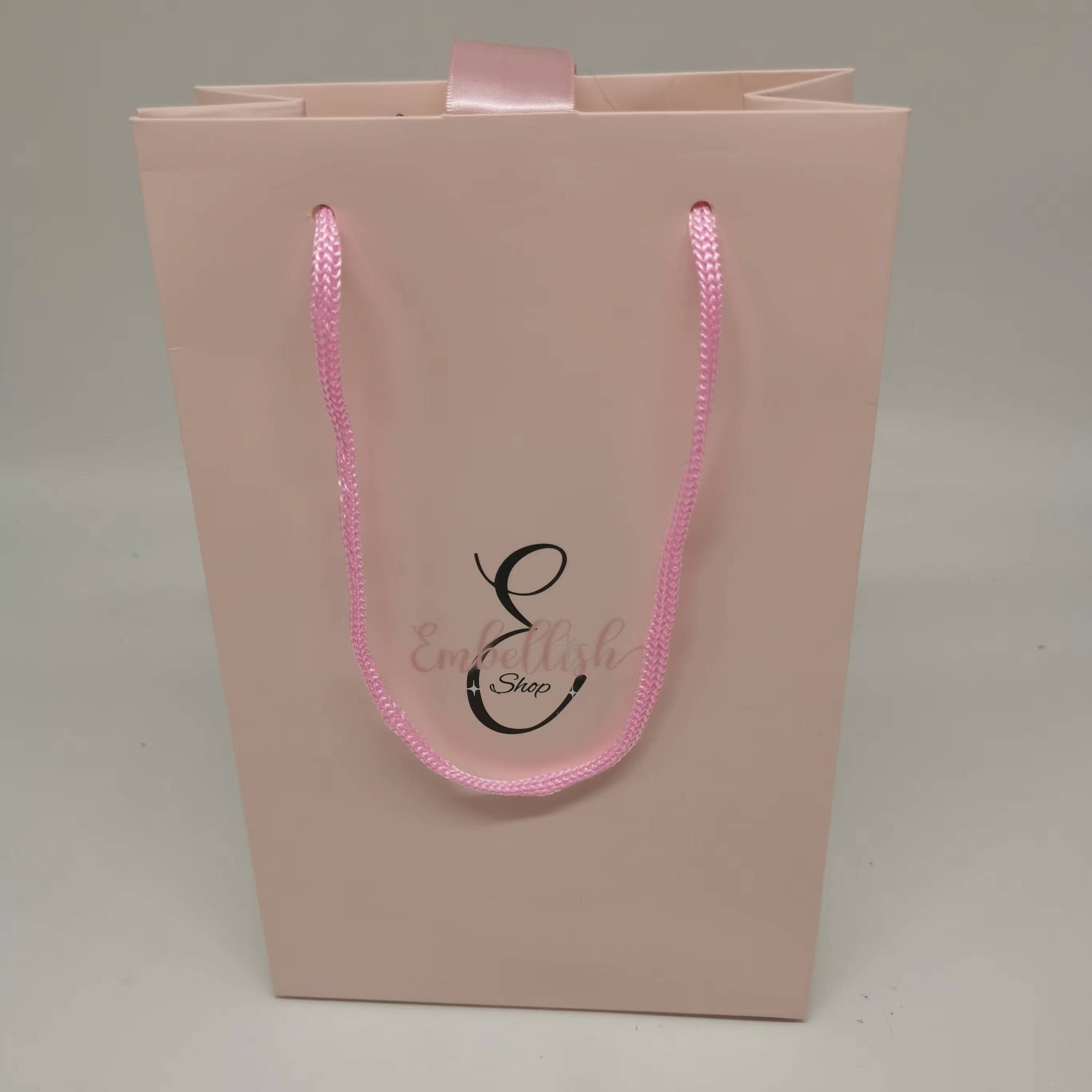 Wholesale custom printed unique design paper shopping bag with handles and ribbon