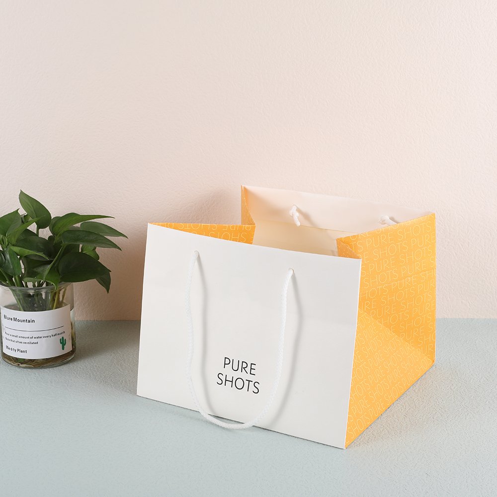 Custom printed logo white paper kraft shopping bag wholesale paper shopping bag for sale