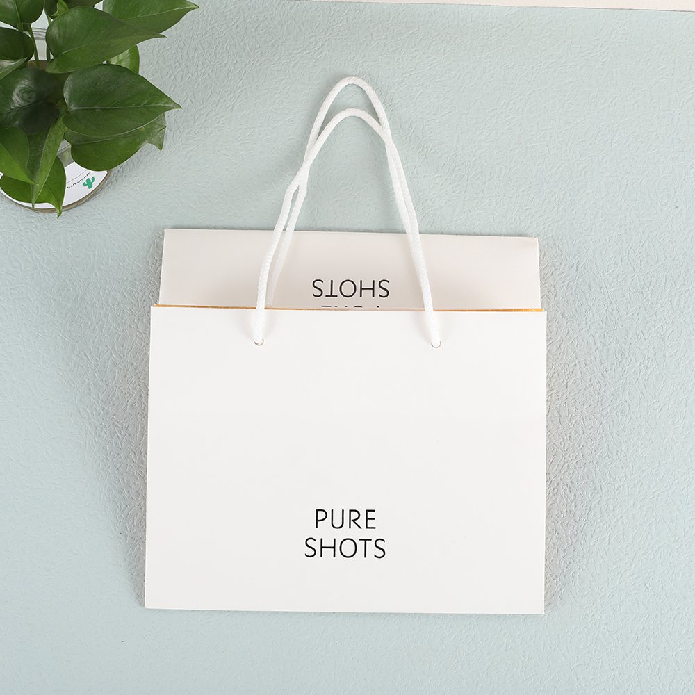 Custom printed logo white paper kraft shopping bag wholesale paper shopping bag for sale