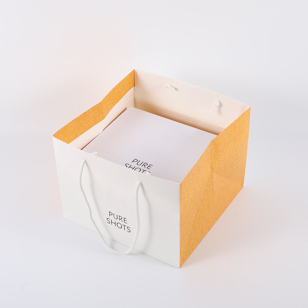 Custom printed logo white paper kraft shopping bag wholesale paper shopping bag for sale
