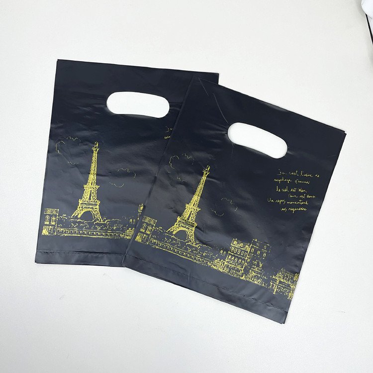 Yiwu Factory Wholesale Four Finger Die-Cutting Shrink Bags for Clothing Store Shopping Plastic Handbag Printing for Rice Use